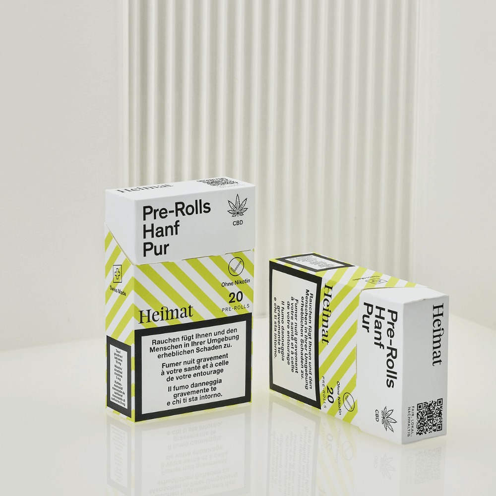 Due confezioni di Pre-Rolls Hanf Pur di Heimat su sfondo bianco